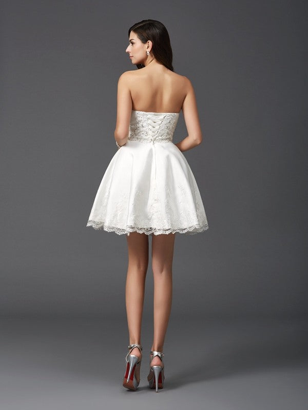 A-Line/Princess Sweetheart Satin Micah Homecoming Dresses Beading Sleeveless Short Dresses